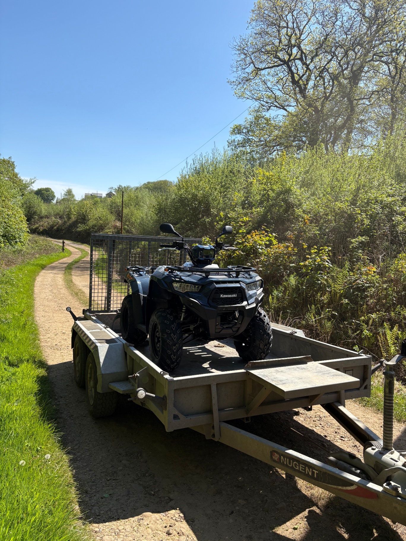 A Kawasaki ATV heading out on our trailer